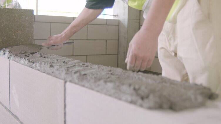 建筑工地砌墙施工钻孔浇注水泥「组镜」