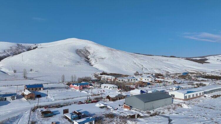 航拍呼伦贝尔雪原小村庄