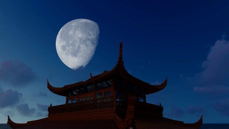 夜晚屋檐和树梢上空的月亮