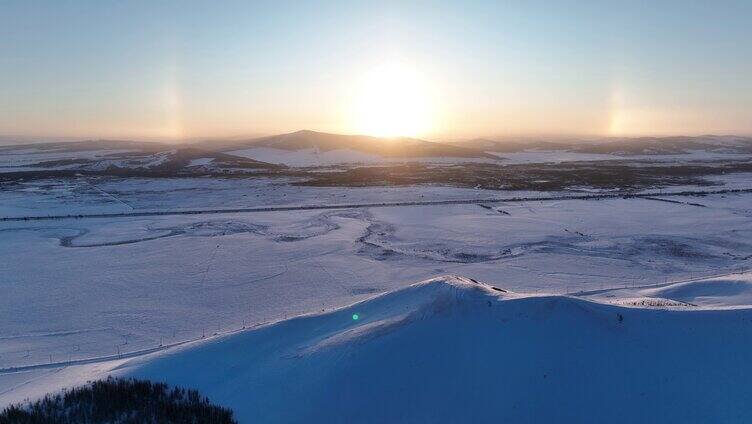 航拍呼伦贝尔雪域雪原灿烂夕阳