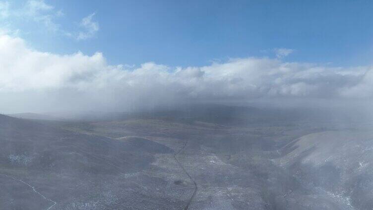 航拍大兴安岭春季降雪山林雾凇