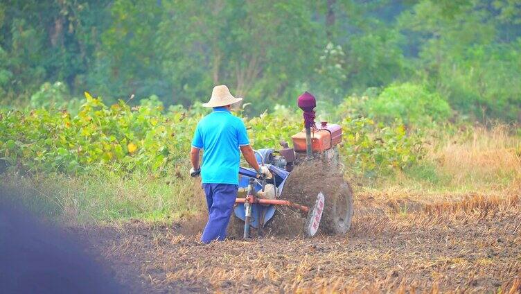 田园风光农民播种收割水稻锄地耕耘
