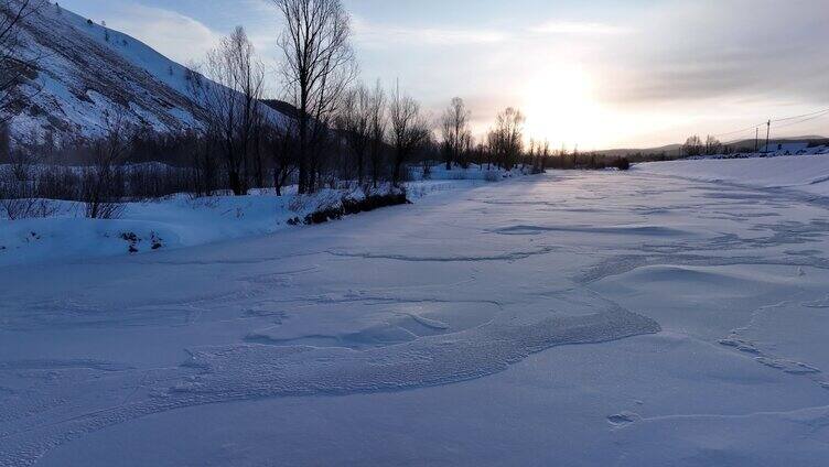 航拍雪原冰河朝阳