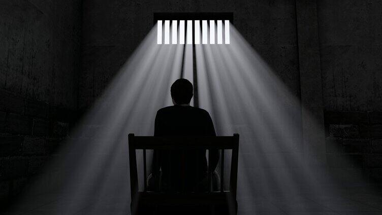 在监狱里静坐悔过思考的罪犯