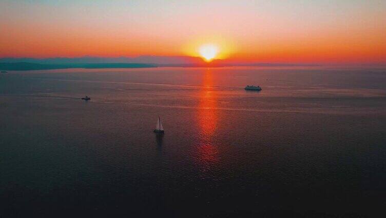 大海日出帆船航行渔船出海海上夕阳落日