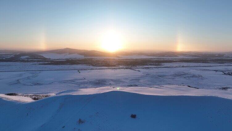 航拍呼伦贝尔雪域雪原灿烂夕阳