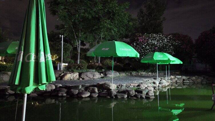 高清城市夜景景区钓鱼遮阳伞