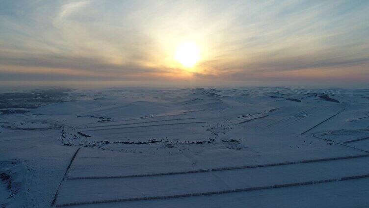 夕阳下的垦区雪原
