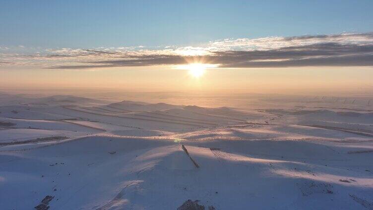 航拍4K东北雪域雪原日落