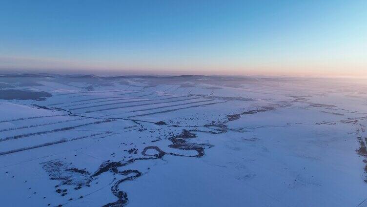 航拍呼伦贝尔雪原河湾暮色