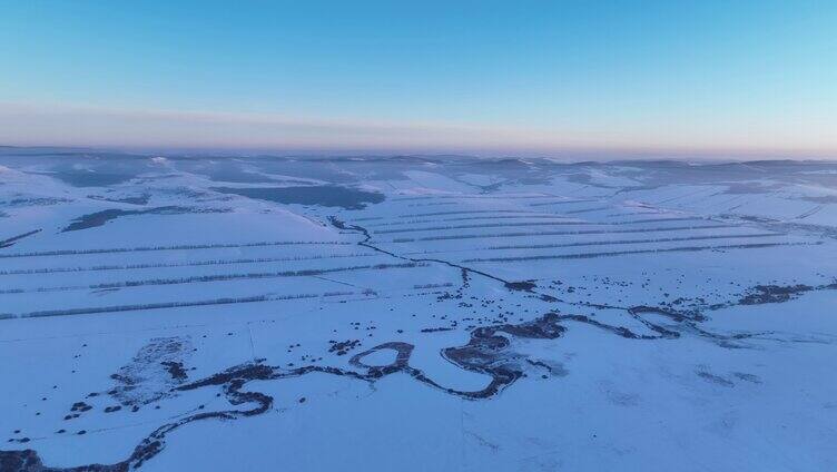 航拍呼伦贝尔雪原河湾暮色