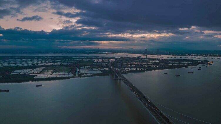 8K航拍广州南沙大桥震撼天气大桥交通延时