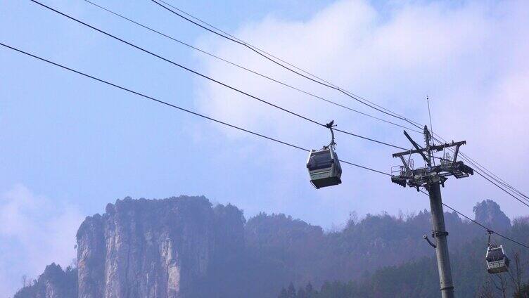 4K特写恩施大峡谷索道缆车山下山实拍视频