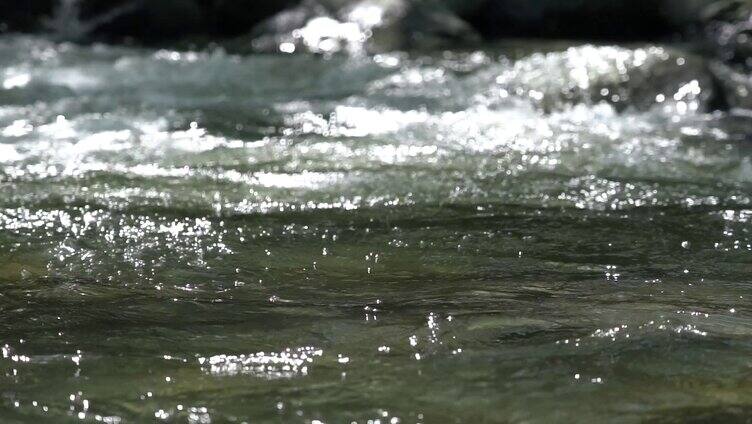 4K奔腾的河水石头空镜意境实拍视频
