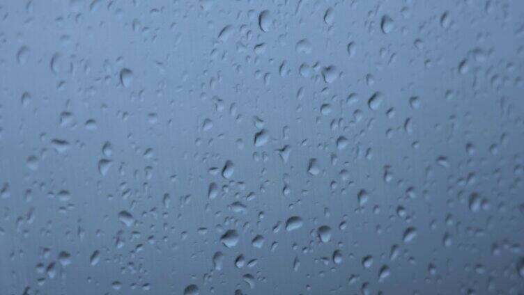 4K玻璃窗下雨雨滴意境空镜实拍视频