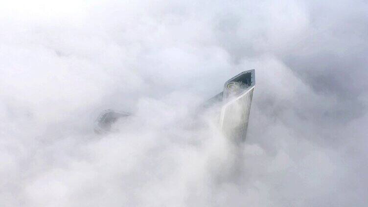 航拍延时南京河西大雾中的双子楼