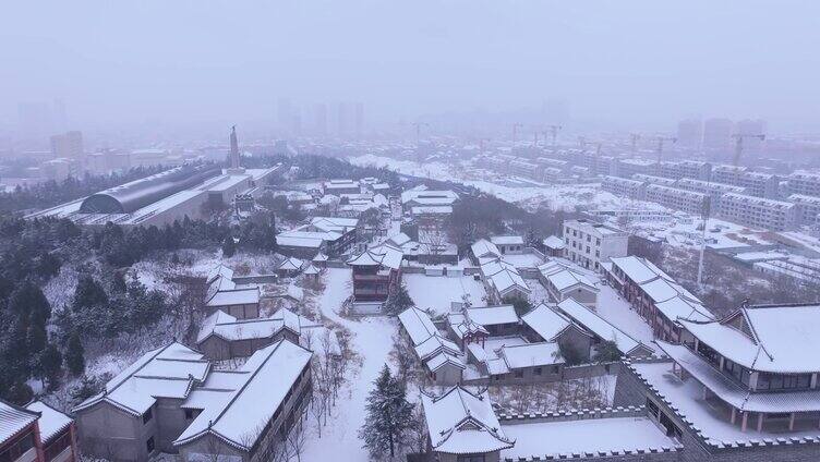 航拍枣庄雪中的影视城临山阁