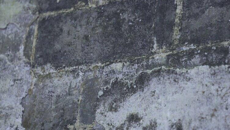斑驳的墙面岁月的侵蚀痕迹墙砖腐蚀古老宏村
