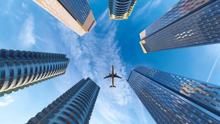 飞机从城市高楼屋顶飞过