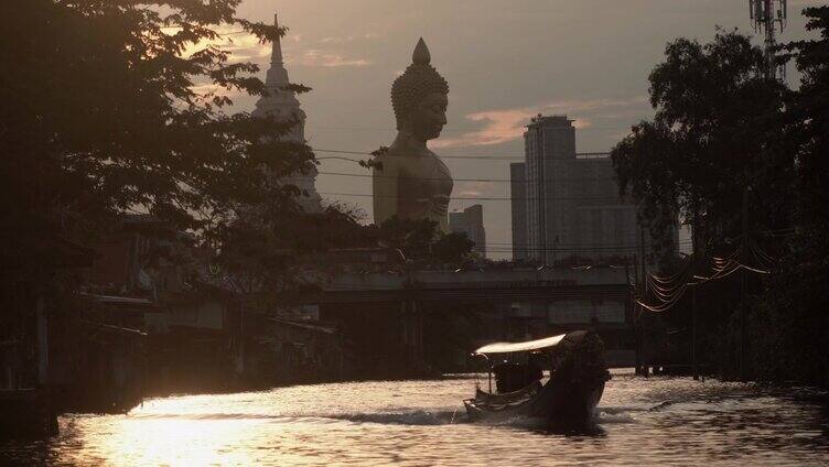 傍晚的日落，泰国曼谷的大佛雕像。