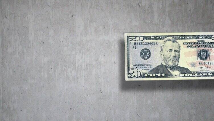 神奇货币:1美元纸币在混凝土上变成50美元纸币