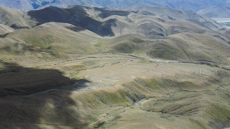 航拍西藏日喀则市加乌拉山108拐盘山公路