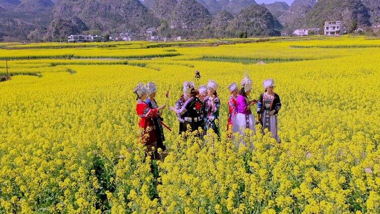 航拍贵州兴义春日万峰林油菜花海乡村游