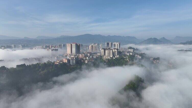 城市云雾山脉植被航拍纳雍城市