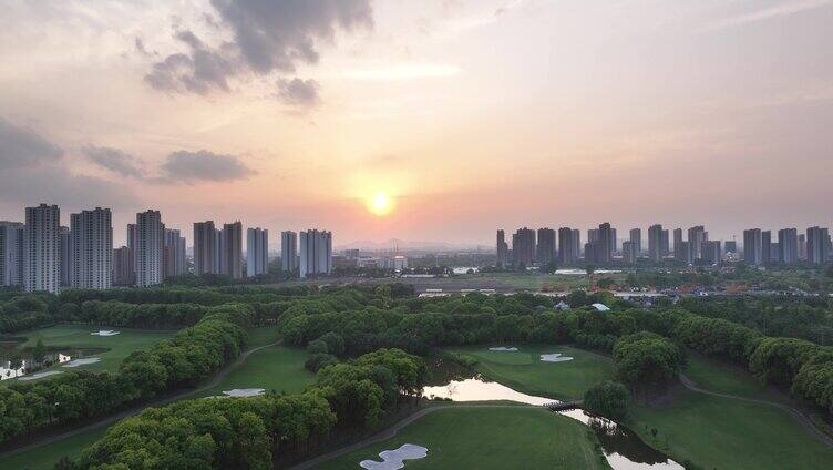 夕阳城市绿化航拍镜头