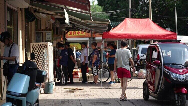 天津早市吃饭排队人群