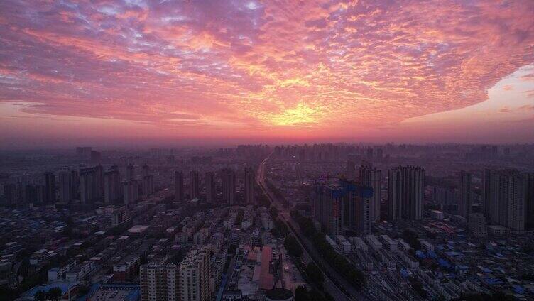 秋季航拍城市日出延时