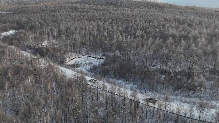 航拍车队冬天雪景