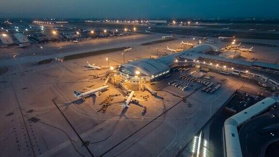 间隔拍摄北京首都国际机场日落航站楼鸟瞰图