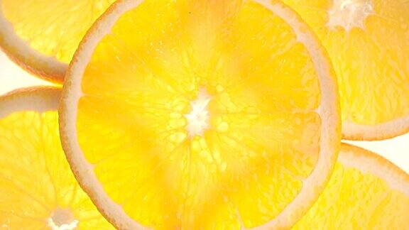 近距离切片橙色在白色的背景新鲜健康的水果