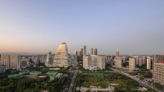 间隔拍摄北京市中心摩天大楼日落与交通流量中国