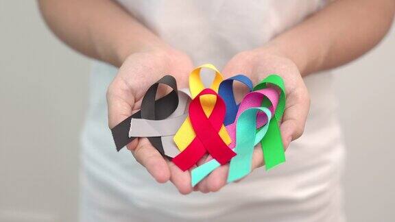 2月4日世界癌症日支持生活和疾病的彩带保健、斗争、医疗和国家癌症生存日、自闭症意识日