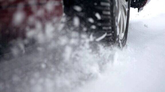 高清超级慢动作:车轮在雪中旋转