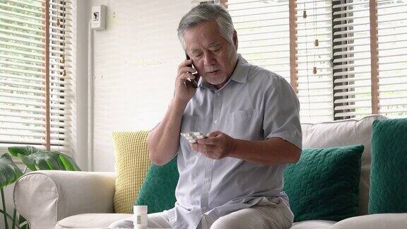 老男人用智能手机在家里跟医生谈药物咨询科技、医疗、健康、制药的生活理念4k决议