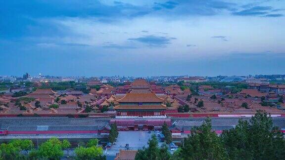 从景山鸟瞰紫禁城白天到晚上的时间流逝在北京中国