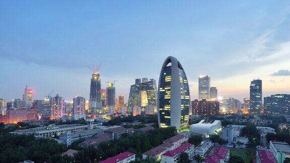 鸟瞰图北京城市和CCTV总部昼到夜过渡缩放