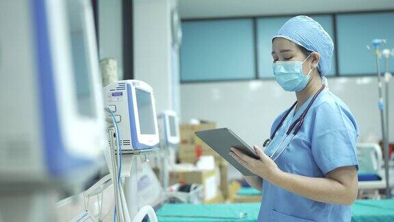 4K女医生在医院使用数码平板电脑工作