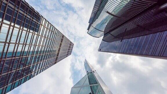 4K时间推移:香港城市的高层摩天大楼的垂直视图现代城市商务区背景