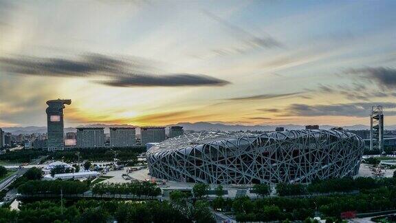 间隔拍摄北京地标国家体育场(鸟巢)日落奥林匹克体育中心中国