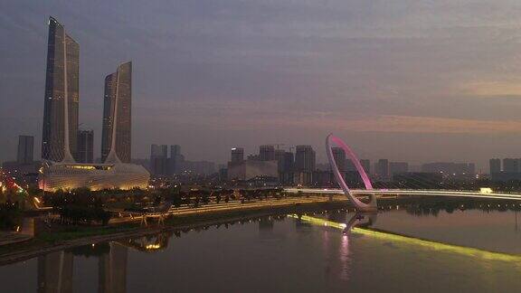 日落夜光南京国际青年文化中心人行滨江大桥航拍全景4k中国