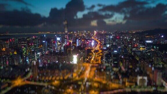 日落之夜照亮著名的深圳市交通路口航拍全景4k倾斜shift时间推移中国