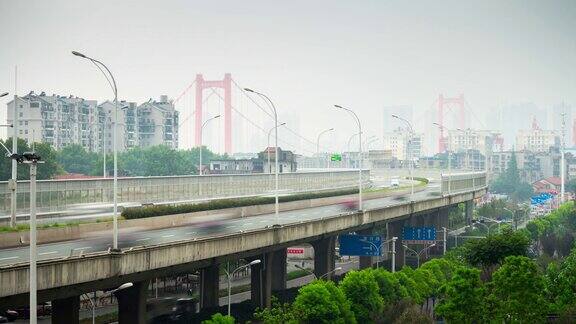 武汉市白天时间交通路口边著名大桥全景4k时间流逝中国