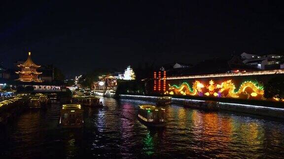 夜间照明南京古城江边游船码头前全景4k中国