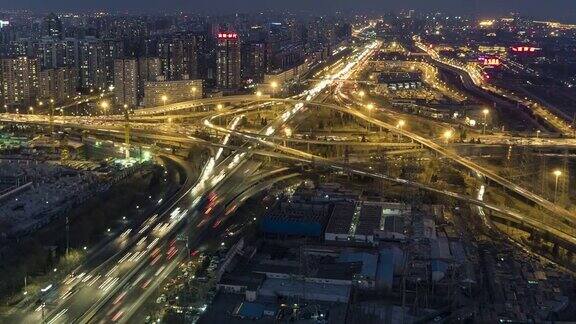 中国北京TD路交叉口黄昏到夜晚过渡四会桥