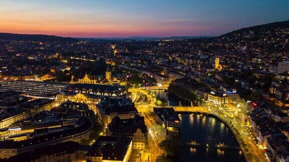 日落夜晚照明苏黎世中心城市景观河边航拍全景4k时间流逝瑞士