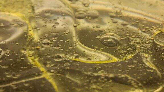 金黄色的气泡油滴抽象的背景